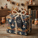 Vintage witch Halloween wrapping paper with cream twine bow and coffin gift tag by Wrapped Studios.