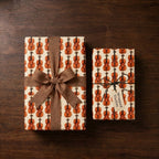 Music themed violin wrapping paper by Wrapped Studios on gifts with a brown burlap bow.