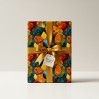 Modern gift wrapped in abstract watercolor pattern paper with a gold satin ribbon and bow.
