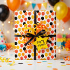 Playful watercolor balloon birthday wrapping paper with a party ribbon by Wrapped Studios.