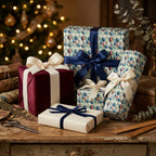 Blue balloon wrapping paper and luxury holiday gift wrap on Christmas presents by Wrapped Studios.