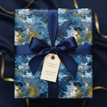 Elegant abstract navy blue wrapping paper with gold accents and satin ribbon.