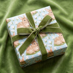 Luxury bunny gift wrap with green velvet ribbon on an Easter gift box by Wrapped Studios.