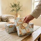 Cute bunny wrapping paper on gifts with raffia ribbon for Easter or baby showers, by Wrapped Studios.