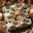 Rustic farmhouse wrapping paper featuring chickens and berries, tied with raffia by Wrapped Studios.