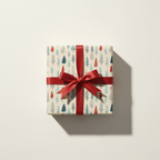 Festive Christmas wrapping paper featuring a whimsical red, white, and blue tree pattern, tied with a luxurious red satin ribbon and bow.