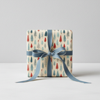 Modern Christmas wrapping paper with colorful trees and a blue ribbon, perfect for holiday gifts.