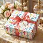 Religious baptism wrapping paper with watercolor crosses and pink ribbon by Wrapped Studios.