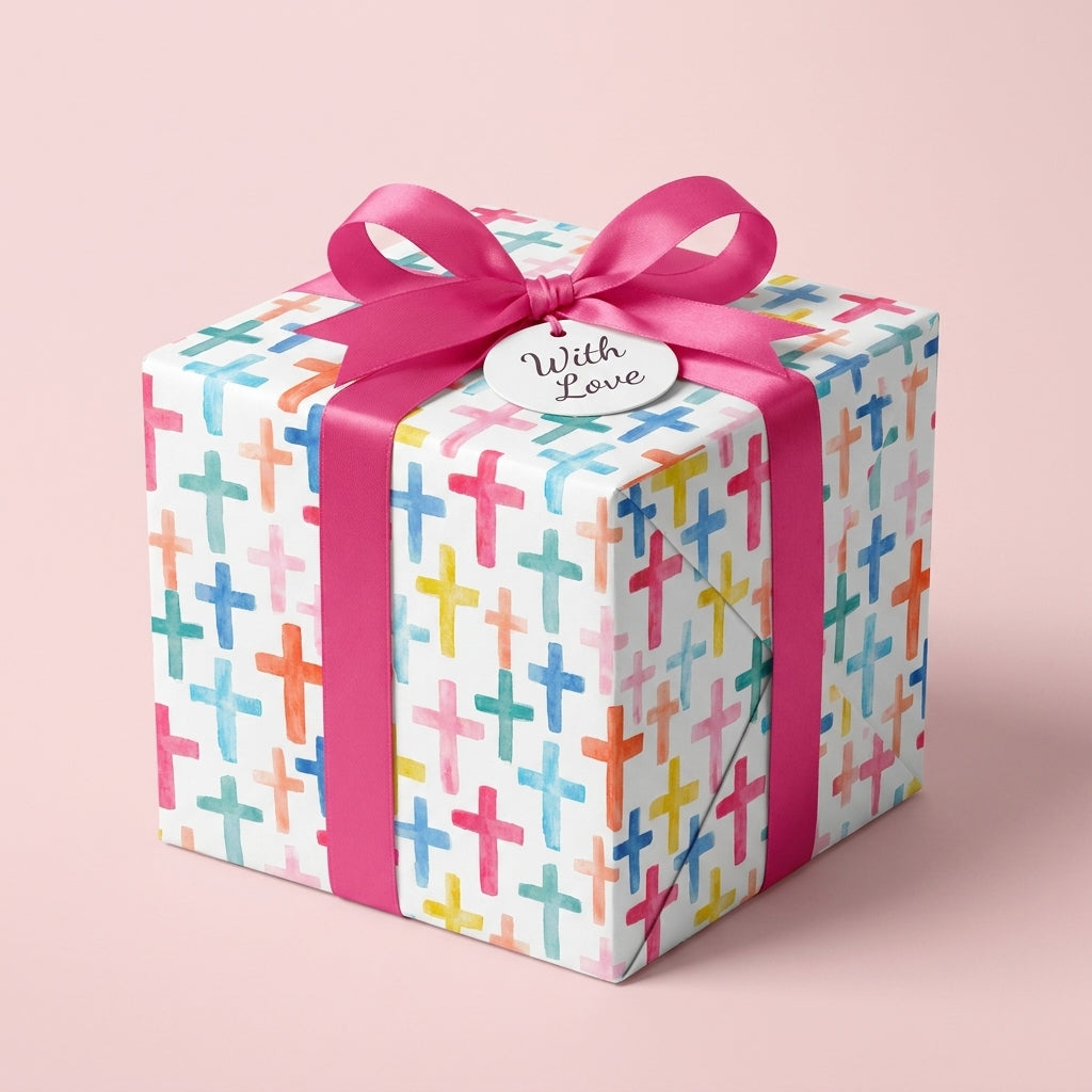 Watercolor cross wrapping paper with a pink bow for baptism, Easter, or christening by Wrapped Studios.