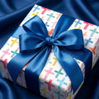 Watercolor cross baptism wrapping paper with blue satin bow on gift box, by Wrapped Studios.