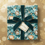 Elegant Christmas gift wrap with festive ornament pattern and a velvet bow.
