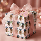 Pink graduation wrapping paper with floral graduate design and pink bow by Wrapped Studios.