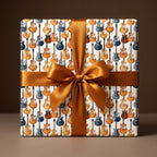 Retro guitar wrapping paper with a gold satin bow for a music lover's birthday by Wrapped Studios.