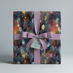 Elegant gift wrapped in watercolor floral wrapping paper with mauve ribbon and "A Special Gift" tag.