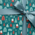 Teal Christmas wrapping paper with a playful Santa and winter tree pattern, tied with a elegant blue-grey satin ribbon, perfect for holiday gifts.