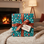 Whimsical Christmas wrapping paper with Santa and trees, tied with a satin ribbon and "Happy Holidays" tag, in a cozy fireside setting.