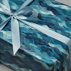 Abstract blue wave wrapping paper on gift box, tied with light blue ribbon.
