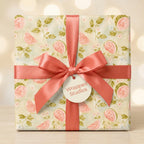 Watercolor watermelon wrapping paper with coral ribbon and gift tag by Wrapped Studios.