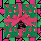 Fun watermelon slice wrapping paper with a pink ribbon and "Slice of Fun!" gift tag, perfect for a playful birthday or summer gift.