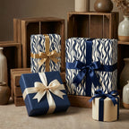 Elegant gifts wrapped in modern wave-pattern wrapping paper with satin ribbons.