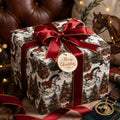 Equestrian Christmas wrapping paper with vintage horse pattern and a red satin bow, by Wrapped Studios.