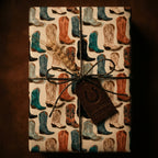 Rustic cowboy boot wrapping paper with twine and a horseshoe tag by Wrapped Studios.
