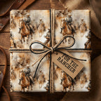 Rancher gift wrapped in cowboy horse wrapping paper, tied with twine and a "For the Rancher" tag.