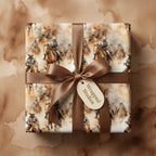 Western wrapping paper featuring cowboys on horseback, accented with a brown satin bow.