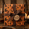 Acoustic guitar wrapping paper with a rustic burlap ribbon and gift tag by Wrapped Studios.
