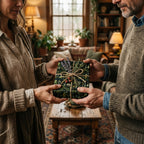 Giving a gift wrapped in botanical print wrapping paper and tied with rustic twine.