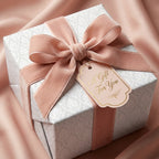 Elegant damask wedding wrapping paper with a blush pink velvet bow and gift tag, by Wrapped Studios.