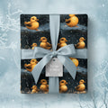 Festive baby shower gift wrap with adorable ducks, tied with a silvery-blue satin ribbon and "Warm Wishes" tag.