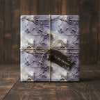 Elegant gift wrapped in lavender floral wrapping paper with twine bow and "To My Dearest" tag.
