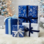 Elegant blue floral wrapping paper on Christmas gifts with velvet ribbons and bows.