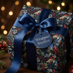 Luxury botanical Christmas wrapping paper with navy satin ribbon and gift tag by Wrapped Studios.