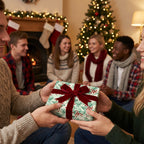 Christmas gift exchange. Gift wrapped in festive floral paper with red velvet ribbon.
