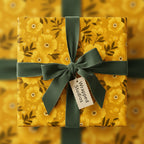 Square gift wrapped in yellow floral wrapping paper with olive green velvet ribbon.